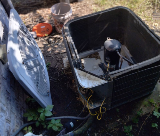 outdoor 3-ton condenser with fan motor removed